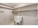 Utility room with basin sink and shelving at 12204 Pepper Mill Dr, Hudson, FL 34667
