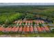 Charming single-Gathering home featuring a private pool in a desirable neighborhood near lush greenery and a serene lake at 1260 Dartford Dr, Tarpon Springs, FL 34688