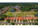 Stunning aerial view of the homes, golf course and ponds at Crescent Oaks, a premier golfing community in Tarpon Springs at 1260 Dartford Dr, Tarpon Springs, FL 34688