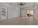 Spacious main bedroom with ensuite bathroom and lanai access at 1260 Dartford Dr, Tarpon Springs, FL 34688