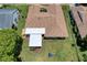 Aerial view of the property showing the roof, backyard, and landscaping at 13111 Sheridan Dr, Hudson, FL 34667