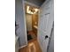 Cozy bathroom with wood flooring, a built-in vanity, and a modern ceiling fan at 13111 Sheridan Dr, Hudson, FL 34667
