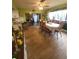Cozy dining room with traditional wooden furniture, bathed in natural light, creating a warm and inviting dining experience at 13111 Sheridan Dr, Hudson, FL 34667