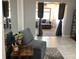 Comfortable living room featuring neutral tones and ample seating, creating a cozy space for relaxation and entertainment at 13111 Sheridan Dr, Hudson, FL 34667