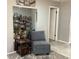 Sitting area features a mirrored wall, enhancing the sense of space and light, offering a stylish spot to relax at 13111 Sheridan Dr, Hudson, FL 34667