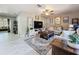 Inviting living room with stylish furniture, a decorative rug, and hardwood floors, perfect for entertaining at 13111 Sheridan Dr, Hudson, FL 34667