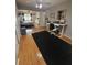 Spacious main bedroom offering an expansive layout and a cozy, carpeted retreat at 13111 Sheridan Dr, Hudson, FL 34667