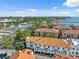 High angle showing rooftops of community buildings, roads, and waterways at 1340 Bayshore Blvd # 411, Dunedin, FL 34698