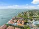 Aerial view showcasing stunning waterfront condos with private boat docks and gorgeous water views at 1340 Bayshore Blvd # 411, Dunedin, FL 34698