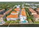 Stunning waterfront condos feature a community pool with lush tropical landscaping, creating a relaxing oasis at 1340 Bayshore Blvd # 411, Dunedin, FL 34698