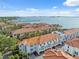 Aerial view showcasing the waterfront community's layout and proximity to the bay at 1340 Bayshore Blvd # 411, Dunedin, FL 34698