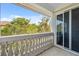 Balcony view with white railings offering outdoor space to a residence at 1340 Bayshore Blvd # 411, Dunedin, FL 34698