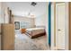 Spacious bedroom featuring a ceiling fan, window with shutters and neutral walls at 1340 Bayshore Blvd # 411, Dunedin, FL 34698