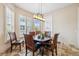Cozy dining area with a pendant light fixture and views of the neighborhood at 1340 Bayshore Blvd # 411, Dunedin, FL 34698
