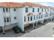 Exterior view highlighting the architectural details, covered parking, and well-maintained landscaping at 1340 Bayshore Blvd # 411, Dunedin, FL 34698