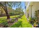 Exterior view of property with lawn, trees, plants and architectural features at 1340 Bayshore Blvd # 411, Dunedin, FL 34698