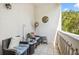 Cozy outdoor patio area with comfortable wicker seating, perfect for relaxing and enjoying the fresh air at 1340 Bayshore Blvd # 411, Dunedin, FL 34698
