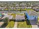 Aerial view of the waterfront property surrounded by canals, perfect for boating enthusiasts at 13632 Britton Dr, Hudson, FL 34667