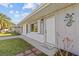 Charming single-story home features a welcoming front door and a cozy, inviting facade at 13632 Britton Dr, Hudson, FL 34667