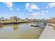 A waterfront property with a private dock and canal view offers easy access to the water at 13632 Britton Dr, Hudson, FL 34667