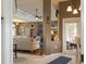 Spacious living room viewed through an entryway, features open floor plan and tile flooring at 13942 Talmage Loop, Hudson, FL 34667