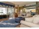 Inviting living area features a view to the kitchen and access to the lanai at 13942 Talmage Loop, Hudson, FL 34667