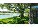 Relax and enjoy the pond view from your screened in lanai at 15038 Tamarind Loop, Spring Hill, FL 34609