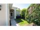 Inviting front entrance with well-maintained landscaping and charming details at 15038 Tamarind Loop, Spring Hill, FL 34609