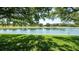 A beautiful pond and golf course provide an excellent backdrop for this home at 15038 Tamarind Loop, Spring Hill, FL 34609