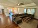 Inviting living room with an open layout, perfect for entertaining and relaxation, and seamless kitchen access at 15585 Rene Ct, Brooksville, FL 34604
