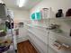 Pantry featuring wire shelving with ample storage for canned goods, containers, and other household items at 15585 Rene Ct, Brooksville, FL 34604