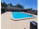 Community swimming pool with plenty of space for swimming laps and recreation at 15585 Rene Ct, Brooksville, FL 34604