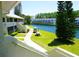 A view from the stairway of the property and golf cart with waterfront views at 1881 Mazo Mnr # I-6, Lutz, FL 33558
