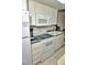 Efficient kitchen equipped with stainless steel appliances and sufficient counter space at 1881 Mazo Mnr # I-6, Lutz, FL 33558