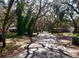 Charming neighborhood street lined with mature trees, creating a picturesque setting at 1916 & 1910 Beachway Ln, Odessa, FL 33556