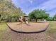 Safe and fun playground with slides, swings, and climbing structures for enjoyment at 1916 & 1910 Beachway Ln, Odessa, FL 33556