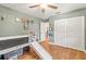bedroom with laminate floors, closet and playroom area at 2400 Commack Ct, New Port Richey, FL 34655