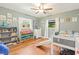 ' bedroom with playful decor, organized storage, and natural light at 2400 Commack Ct, New Port Richey, FL 34655