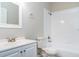 Clean bathroom featuring a vanity with mirror and a shower-tub combination at 2729 Penzance St, Palm Harbor, FL 34684