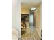 Hallway with wood flooring and a skylight at 2729 Penzance St, Palm Harbor, FL 34684