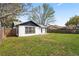 A large, fenced backyard is attached to this lovely home at 3141 Loomis Dr, New Port Richey, FL 34655