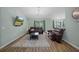 Inviting living room with leather sofas, patterned rug, and tv at 3355 La Vista St, Brooksville, FL 34604