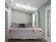 Bright living room with a skylight, recessed lighting, and comfortable seating at 3355 La Vista St, Brooksville, FL 34604