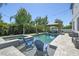 Backyard pool with a spa, lounge chairs, and a gazebo, perfect for outdoor relaxation at 3555 Bracknell Ct, Land O Lakes, FL 34638