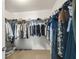 Spacious walk-in closet with ample hanging space and shelving for storage at 3555 Bracknell Ct, Land O Lakes, FL 34638