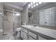 Bathroom with shower and sink with neutral color palette at 4030 Casa Del Sol Way, New Port Richey, FL 34655