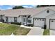 Charming single story home with well-maintained lawn and two-car garage at 4030 Casa Del Sol Way, New Port Richey, FL 34655