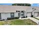 Charming single story home with well-maintained lawn and one-car garage at 4030 Casa Del Sol Way, New Port Richey, FL 34655