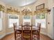 Cozy dining area with natural light and elegant decor at 446 Romine Ct, Spring Hill, FL 34609
