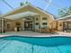 Wonderful pool with view of the outdoor living area at 446 Romine Ct, Spring Hill, FL 34609